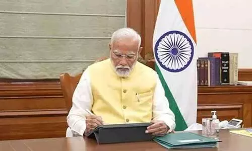 നരേന്ദ്രമോദി പ്രധാനമന്ത്രിയായി ചുമതലയേറ്റു; ആദ്യം ഒപ്പുവെച്ചത് കർഷക ധനസഹായ ബില്ലിൽ