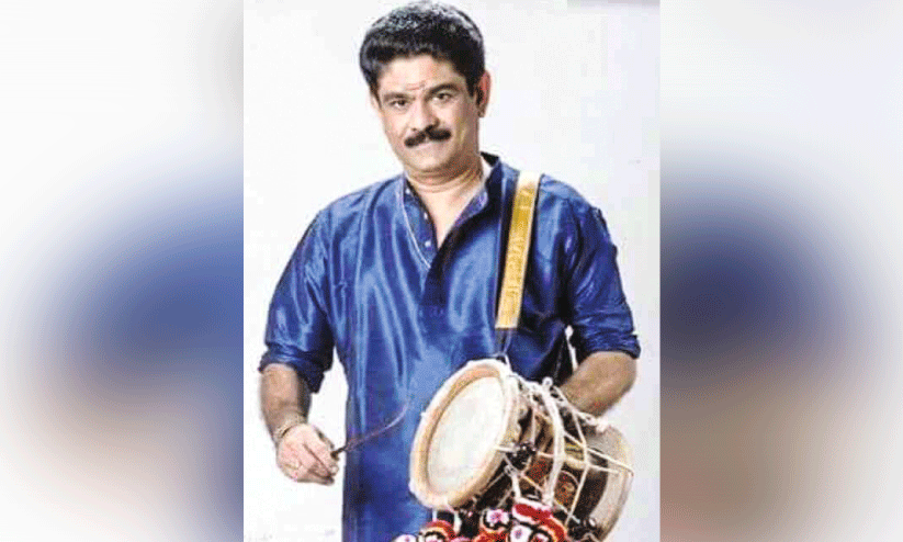 Dr. Thrissur Krishnakumar,