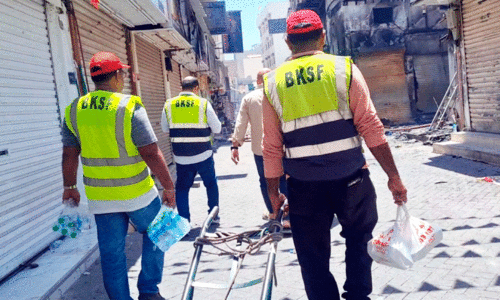 BKSF volunteers distribute food at Manama Souq