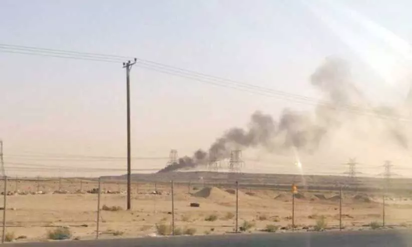 Smoke rising from burning waste disposal site Smoke rising from burning waste disposal site