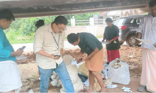 Clearing of garbage dumped near Cheruvathoor flyover