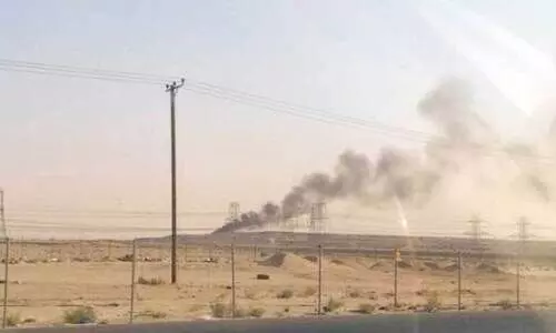 Smoke rising from burning waste disposal site