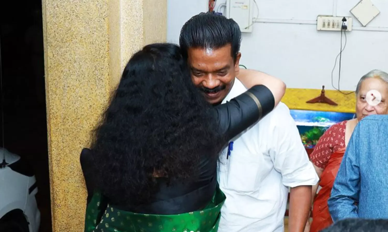 Divya S Iyer, K Radhakrishnan Viral Picture