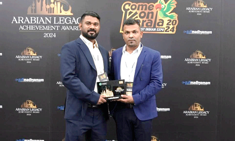 Anas and Faisal with award Anas and Faisal with award
