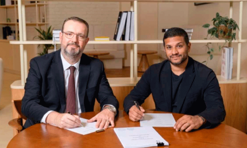 Rack Leisure General Manager Steven Bishop and Rikas Hospitality Founding Managing Partner Rizwan Qasim sign partnership agreement in Dubai