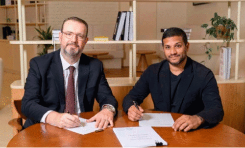 Rack Leisure General Manager Steven Bishop and Rikas Hospitality Founding Managing Partner Rizwan Qasim sign partnership agreement in Dubai