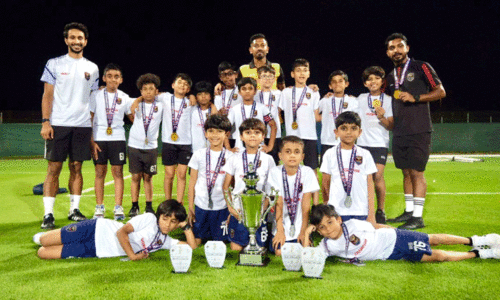 Arabian Strikers team with coaches