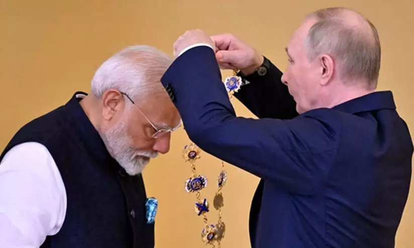 മോദിക്ക് ആൻഡ്രൂ പുണ്യാളന്റെ പേരിലുള്ള റഷ്യൻ പരമോന്നത ബഹുമതി സമ്മാനിച്ചു മോദിക്ക് ആൻഡ്രൂ പുണ്യാളന്റെ പേരിലുള്ള റഷ്യൻ പരമോന്നത ബഹുമതി സമ്മാനിച്ചു