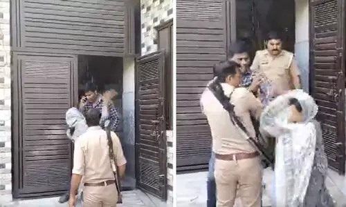 കാമുകിയുടെ വീട്ടിൽനിന്ന് ഭർത്താവിനെ പിടികൂടി; പൊലീസിന് മുന്നിൽ ചെകിട്ടത്തടിച്ച് ഭാര്യ