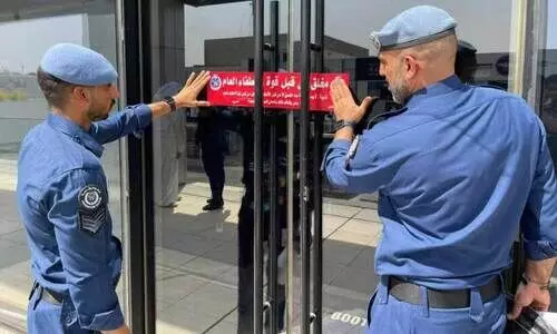 Fire force officials post notices in establishment