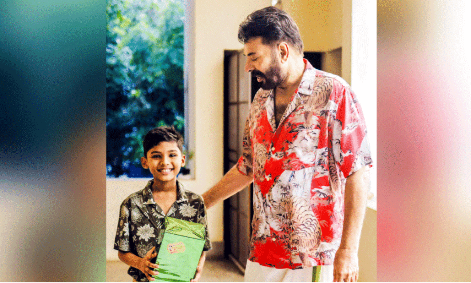 Mammootty giving birthday gift to Mahadev