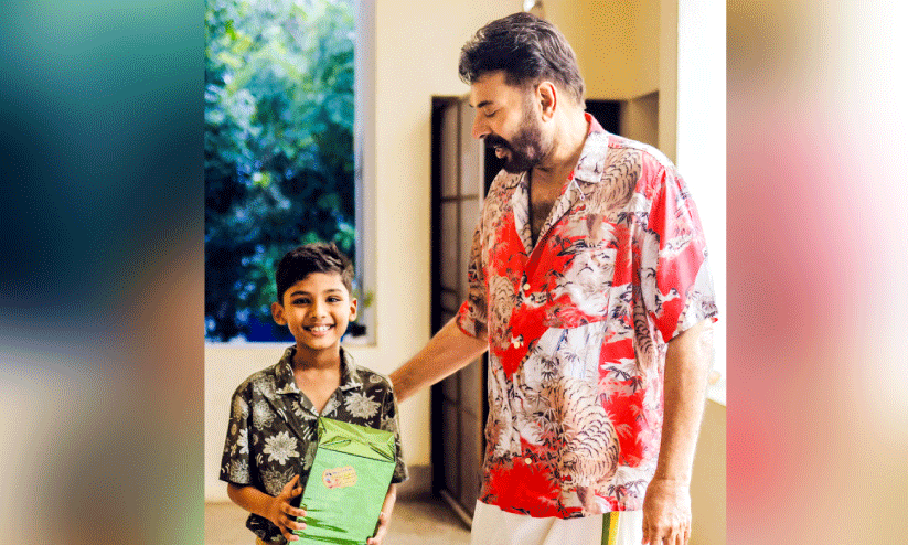 Mammootty giving birthday gift to Mahadev