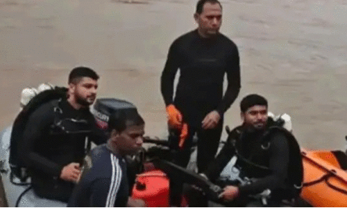 Naval team carrying out rescue operations at the accident site in Ankola