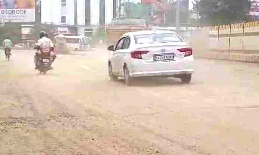 Dust rises of flyover construction
