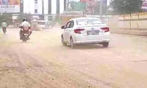Dust rises of flyover construction