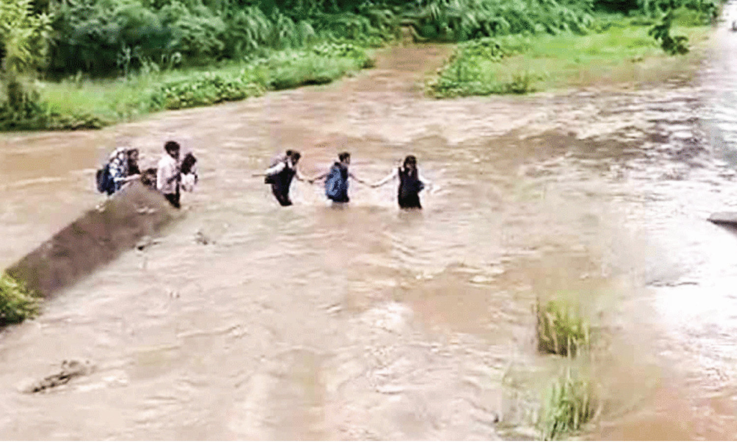 Students crossing Gayathripuzha
