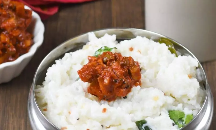 ഊൺ പൊതിയിൽ അച്ചാർ വെച്ചില്ല; 35,025 രൂപ നൽകാൻ ഉത്തരവ്