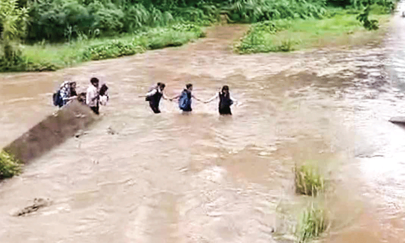 Students crossing Gayathripuzha