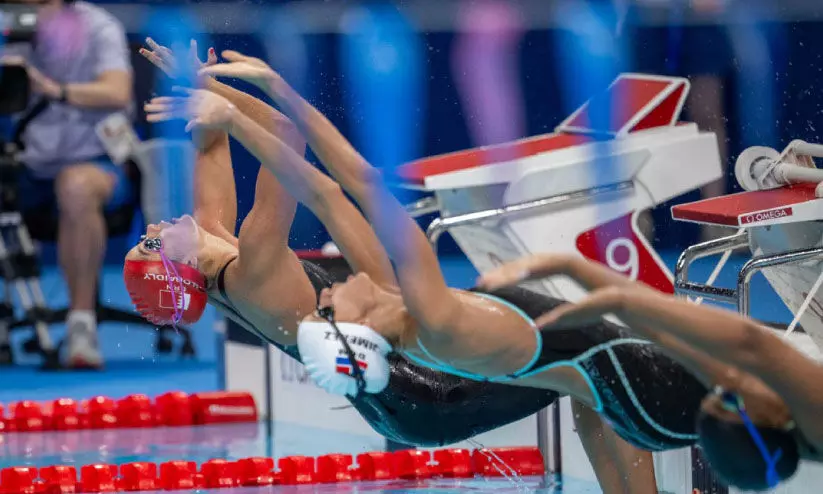 നീ​ന്ത​ൽ മത്സരത്തിൽ നിന്ന്