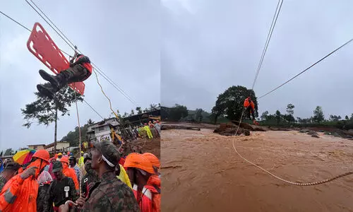 രക്ഷിക്കാൻ നാവികസേനയുടെ 50 റിവർ ക്രോസിങ് ടീം; വടംകെട്ടി ആളുകളെ പുറത്തെത്തിക്കുന്നു