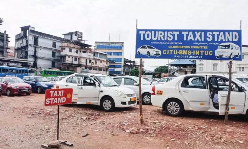 Taxis are parked at Thirunakkara bus stand ground