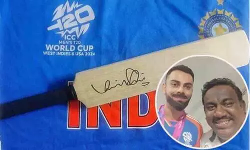 വയനാടിന് തണലേകാൻ കോഹ്‌ലിയുടെ കൈയൊപ്പ് പതിഞ്ഞ ബാറ്റും; ലേലത്തിന് വെച്ച് മലയാളി