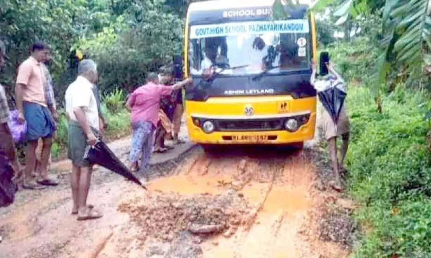 school bus got stuck in the mud