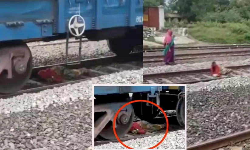 രക്ഷപ്പെടാൻ മറ്റുമാർഗങ്ങളില്ല, റെയിൽ പാളത്തിൽ അനങ്ങാതെ കിടന്നു; ജീവൻ തിരിച്ചുപിടിച്ച യുവതിയുടെ ദൃശ്യം വൈറൽ -വിഡിയോ രക്ഷപ്പെടാൻ മറ്റുമാർഗങ്ങളില്ല, റെയിൽ പാളത്തിൽ അനങ്ങാതെ കിടന്നു; ജീവൻ തിരിച്ചുപിടിച്ച യുവതിയുടെ ദൃശ്യം വൈറൽ -വിഡിയോ