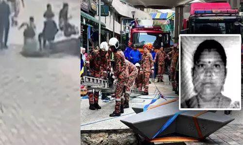 നടപ്പാത പിളർന്ന് പൊടുന്നെനെ താഴേക്ക്; മലേഷ്യയിൽ  26 അടി താഴ്ചയിലേക്ക് വീണ ഇന്ത്യക്കാരിയെ കണ്ടെത്താനായില്ല -വിഡിയോ