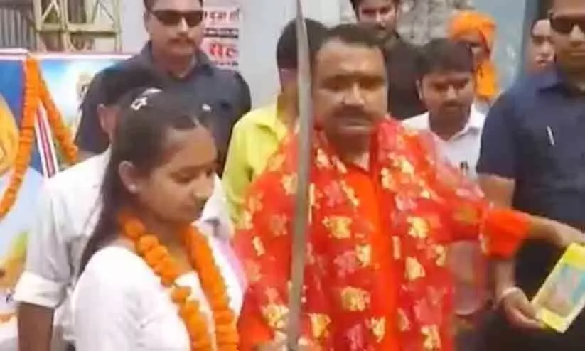BJP MLA Mithilesh Kumar distributed swords among girls during the Vijayadashami celebration in Bihar BJP MLA Mithilesh Kumar distributed swords among girls during the Vijayadashami celebration in Bihar