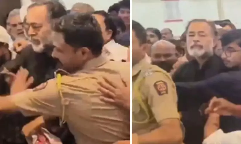 സെമിനാറിനിടെ യോഗേന്ദ്ര യാദവിനെ പിടിച്ചുതള്ളി വഞ്ചിത് ബഹുജൻ അഗാഡി പ്രവർത്തകർ; ഹാളിന് പുറത്തെത്തിച്ചത് പൊലീസ്