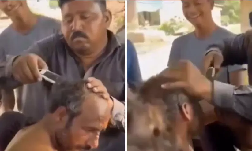 യു.പിയിൽ ചാണകം വാരാൻ വിസമ്മതിച്ച ആദിവാസി യുവാവിന് ക്രൂരമർദനം; ദൃശ്യങ്ങൾ പുറത്ത് യു.പിയിൽ ചാണകം വാരാൻ വിസമ്മതിച്ച ആദിവാസി യുവാവിന് ക്രൂരമർദനം; ദൃശ്യങ്ങൾ പുറത്ത്