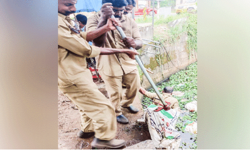 Garbage is removed by municipal workers