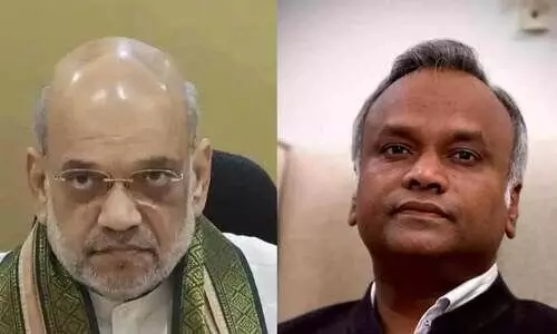 അമിത് ഷായെ കടിച്ചിരിക്കുന്നത് ഭ്രാന്തൻ നായയാണ്; അംബേദ്കർ വിവാദത്തിൽ പ്രതികരിച്ച് പ്രിയങ്ക് ഗാർഗെ