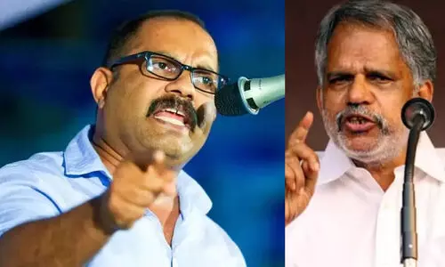 KM Shaji and A Vijayaraghavan