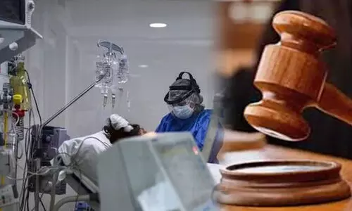 നെഗറ്റിവായിട്ടും കോവിഡ് ചികിത്സ; ഡോക്ടറും ആശുപത്രിയും അഞ്ചു ലക്ഷം നഷ്ടപരിഹാരം നല്‍കാന്‍ വിധി