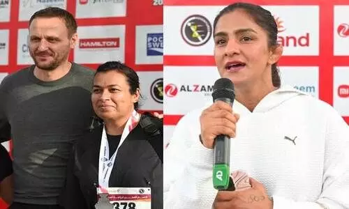 ഖ​ത്ത​ർ റൺ; താ​ര​മാ​യി ഇ​വാ​നും റി​തു ഫോ​ഗ​ട്ടും