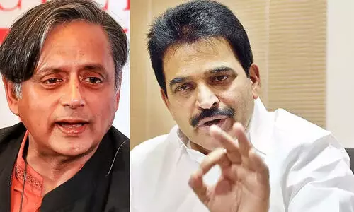 Shashi Tharoor and KC Venugopal