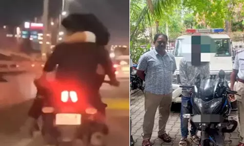 മൂഡ്ഓഫ് ആയ കാമുകിയെ മടിയിലിരുത്തി നഗരത്തിലൂടെ ബൈക്ക് ഓടിച്ച യുവാവ് അറസ്റ്റിൽ -വിഡിയോ