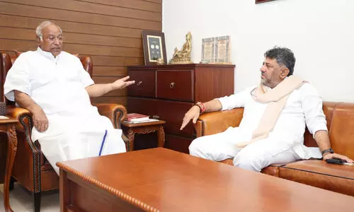 D.K. Shivakumar , Mallikarjuna Kharge