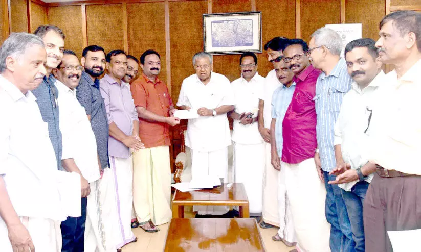 വയനാട് പുനരധിവാസം; കേളി ഒരു കോടി രൂപ കൈമാറി വയനാട് പുനരധിവാസം; കേളി ഒരു കോടി രൂപ കൈമാറി