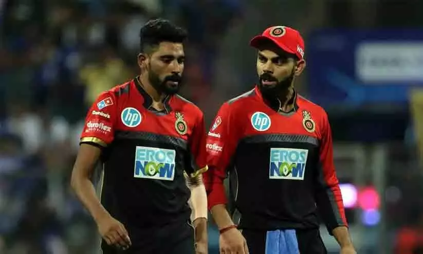 ആർ.സി.ബിയെയും വിരാടിനെയും വിട്ടുപോകുന്നത് വൈകാരികം; മുഹമ്മദ് സിറാജ് ആർ.സി.ബിയെയും വിരാടിനെയും വിട്ടുപോകുന്നത് വൈകാരികം; മുഹമ്മദ് സിറാജ്