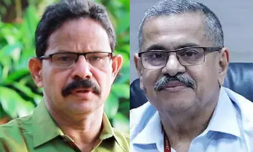 Jomon Puthenpurackal, KM Abraham