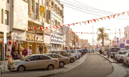 muncipal council in muharraq against open shopes at night