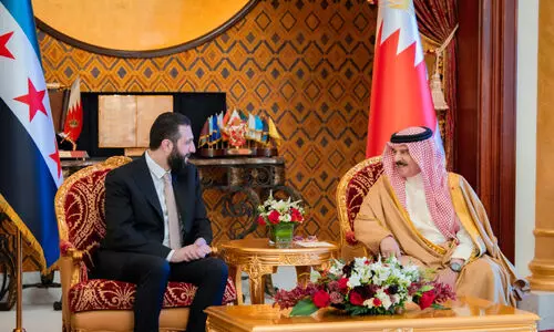King Hamad receives Syrian President