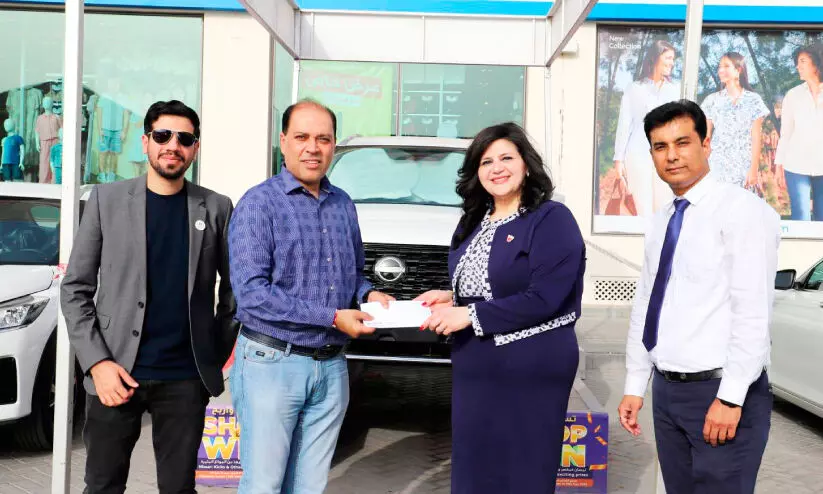 മെ​ഗാ​മാ​ർ​ട്ട് ല​ക്കി ഡ്രോ​യി​ൽ കാ​ർ സ്വ​ന്ത​മാ​ക്കി യു​വ​തി