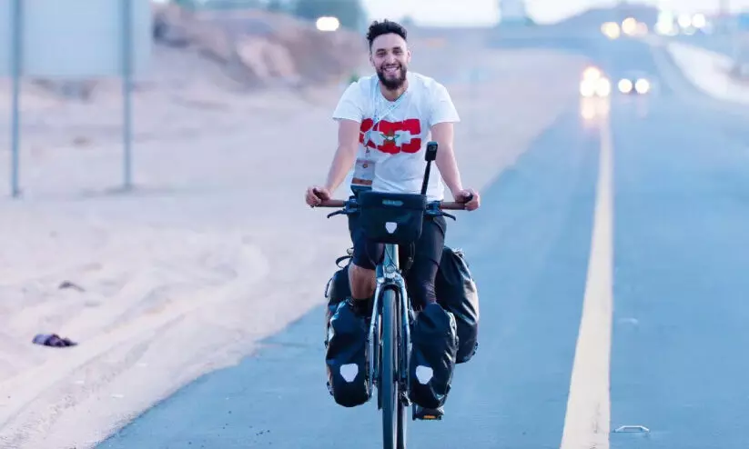 Belgian young man Anas Al-Rizqi, who arrived in Saudi Arabia by bicycle for Hajj