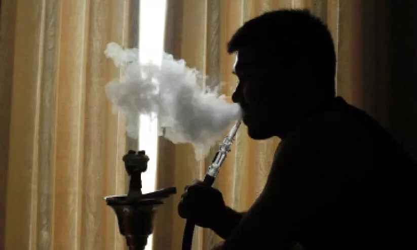 strict action against cafes serving shisha to minors