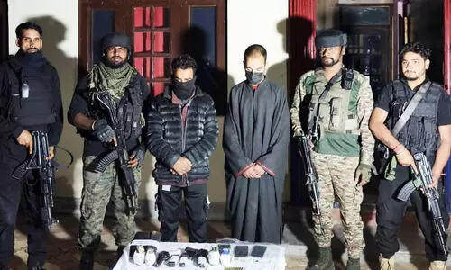 Two terrorist associates arrested in Shopian