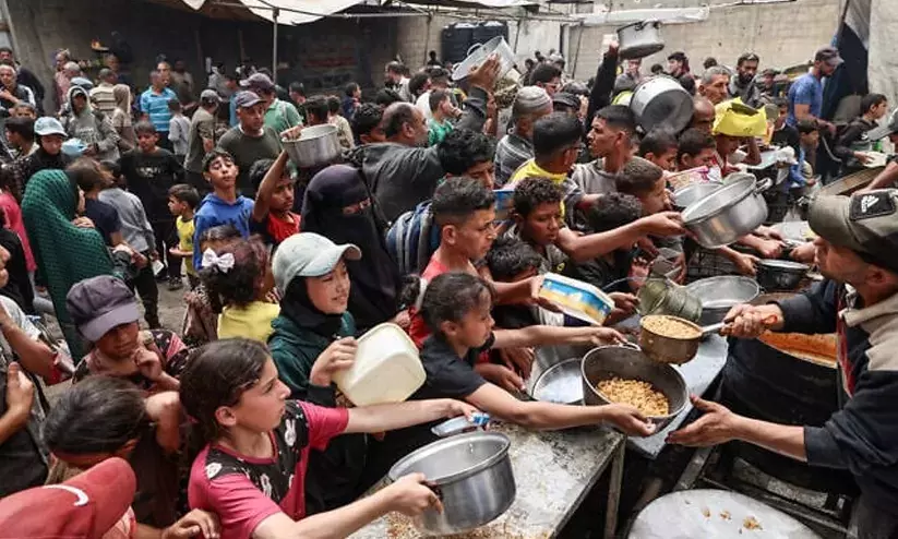 ഇ​സ്രാ​യേ​ൽ ഉ​പ​രോ​ധം: അ​തി​ർ​ത്തി ക​ട​ന്നെത്തി​യ ഭ​ക്ഷ്യ​സാ​ധ​ന​ങ്ങ​ൾ ഗസ്സയിൽ ഇ​തു​വ​രെ വി​ത​ര​ണം​ ചെ​യ്തില്ല